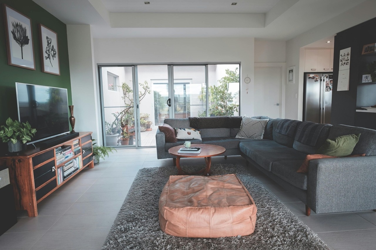 A finished living room retrofitted with smart lighting and control